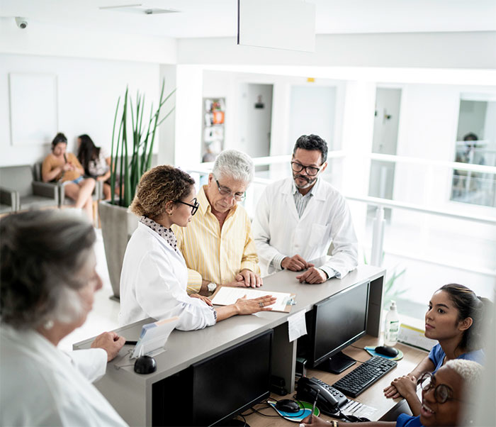 physician explaining document to patient