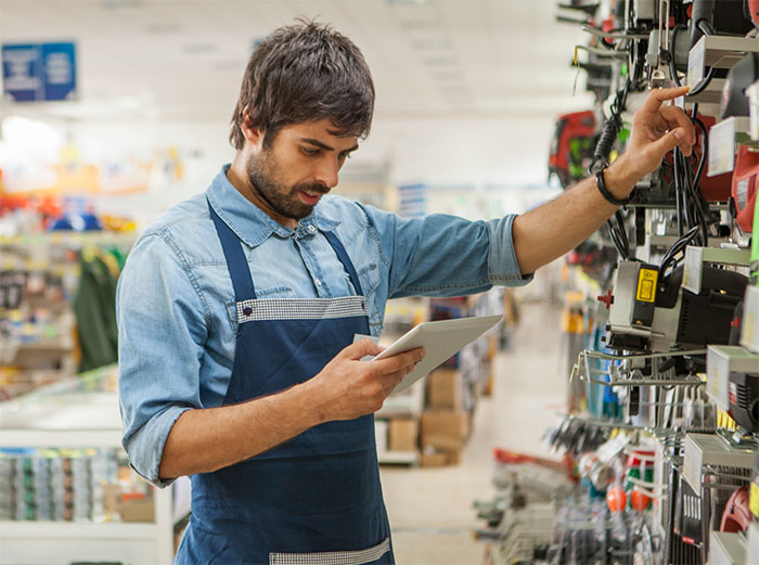 Employee taking inventory