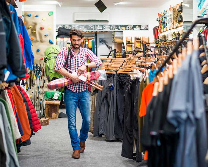 Customer leaving store with merchandise
