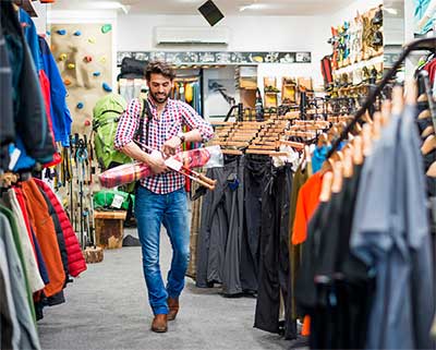 Customer leaving store with merchandise