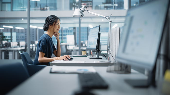 woman working on her computer