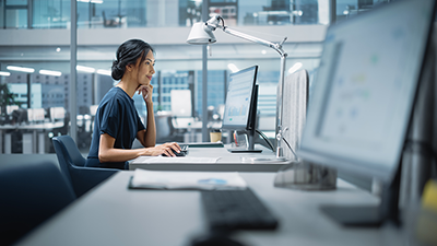 woman working on her computer