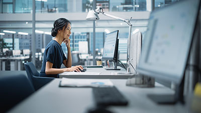 Woman working on her desktop