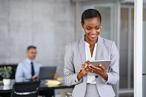 woman working on her tablet