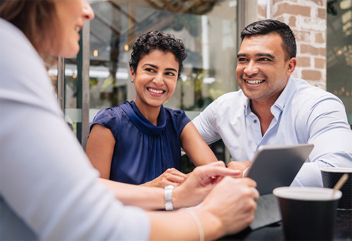 couple going over financing options with lender