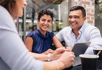 couple going over financing options with lender
