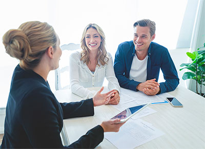 lender talking to a couple