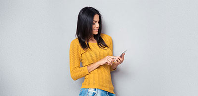 Woman looking at phone.