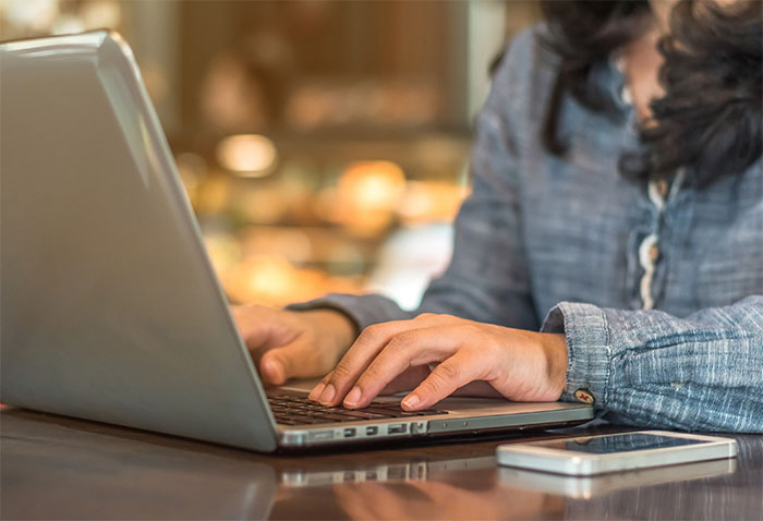 woman working on her laptop