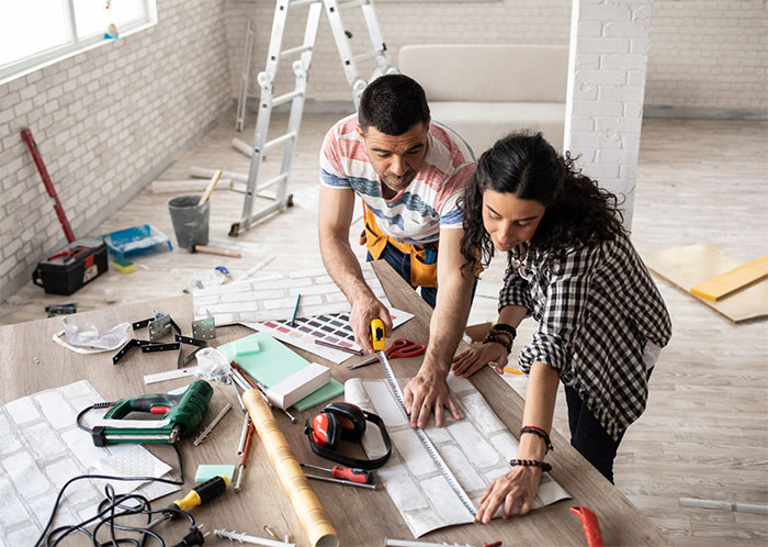 Two people measuring some design patterns.