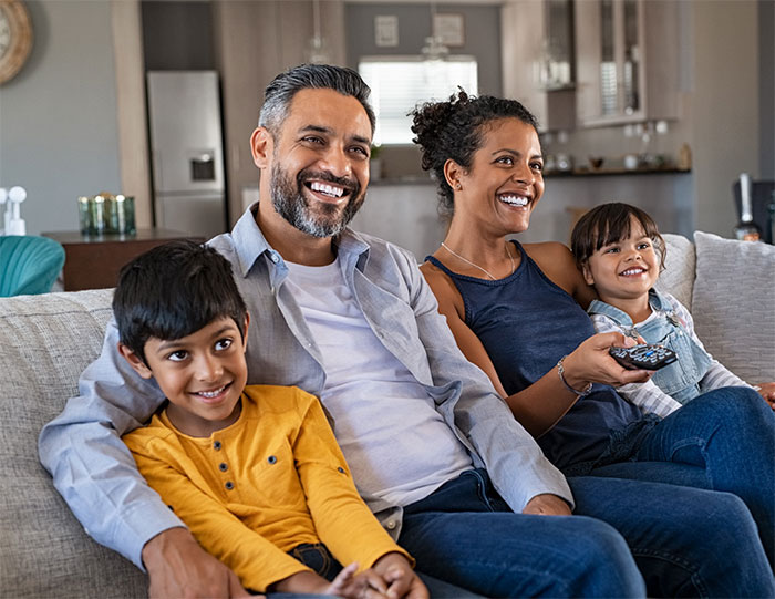 Family watching tv