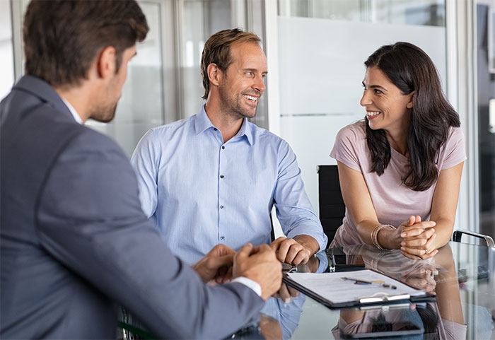 A couple meeting with an advisor.