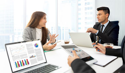 People talking at a business meeting.